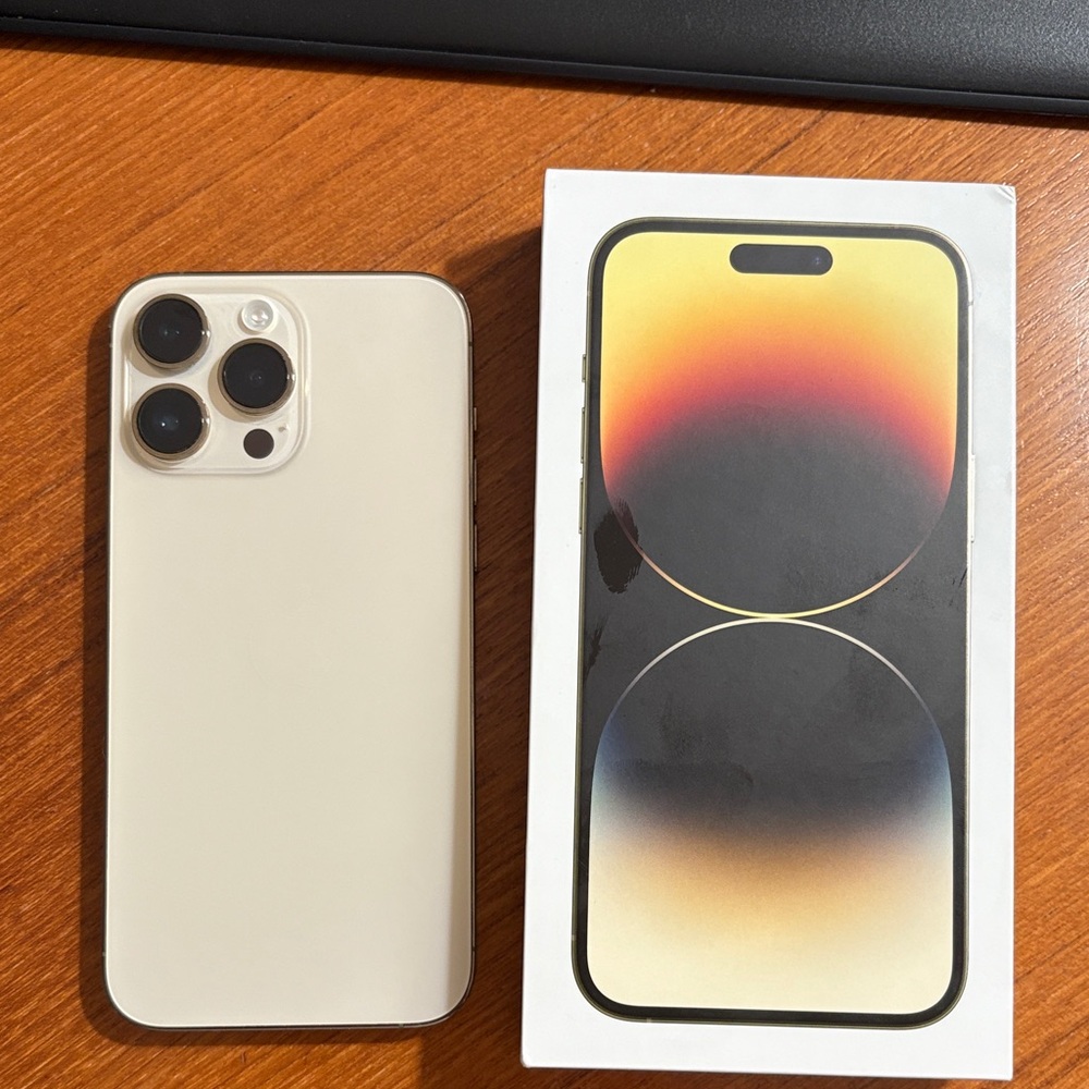 Apple iPhone 14 Pro- cream/gold excellent condition- takes phenomenal pictures